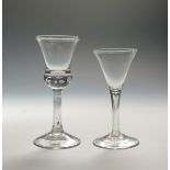 Two large wine glasses c.1760-70, one with a thistle bowl enclosing a row of beaded tears to the