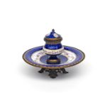A Continental enamel inkstand 19th century, the shaped pot fitted with a porcelain insert, mounted