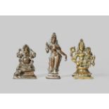 THREE SMALL INDIAN BRONZE FIGURES 19TH CENTURY Comprising: a seated image of Ganesh, a standing