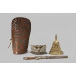 A COLLECTION OF TIBETAN ITEMS 15TH CENTURY AND LATER Comprising: a brass alloy stupa, a small purse,