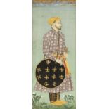 AN INDIAN MINIATURE PAINTING OF A WARRIOR 19TH CENTURY Standing, looking into the distance,
