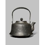 A MASSIVE JAPANESE IRON KETTLE, TETSUBIN 19TH/20TH CENTURY The squat body with a rough ishime