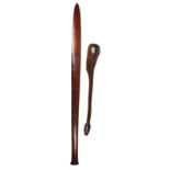 An Australian club, of polished wood, skewed spatulate form with slightly stepped butt; together