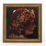 A Cambridge Art Tile Works tile, dust-pressed in low relief with a classical portrait of a