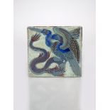 A good William De Morgan Pottery Late Fulham Period triple lustre tile, painted with a bird with a