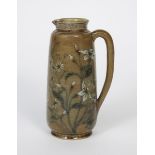 A Martin Brothers stoneware jug by Robert Wallace Martin, dated 1887, shouldered cylindrical form,