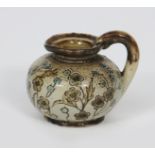 A Martin Brothers stoneware miniature jug by Edwin & Walter Martin, dated 1887, compressed ovoid