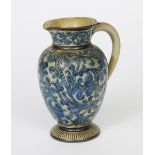 A Martin Brothers stoneware jug by Edwin & Walter Martin, dated 1892, shouldered, footed form with