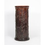 A Burmantofts Faience pottery stickstand, cylindrical form, modelled in low relief with boughs of