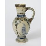 An early Martin Brothers Medieval stoneware jug by Robert Wallace Martin, footed ovoid form with