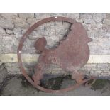 An unusual cut sheet metal plaque in the form of a poodle with scrolled ring outline, 120 cm