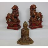 Carved wooden gilt and gesso pair of dogs of fo, together with a similar seated buddistic deity, the