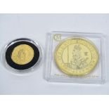 Replica Charles I Triple Unite silver gilt coin with further replica ancient gold coin