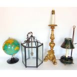 A collection of lighting to include a tollware lantern, a hexagonal hall lantern, a rococo type gilt