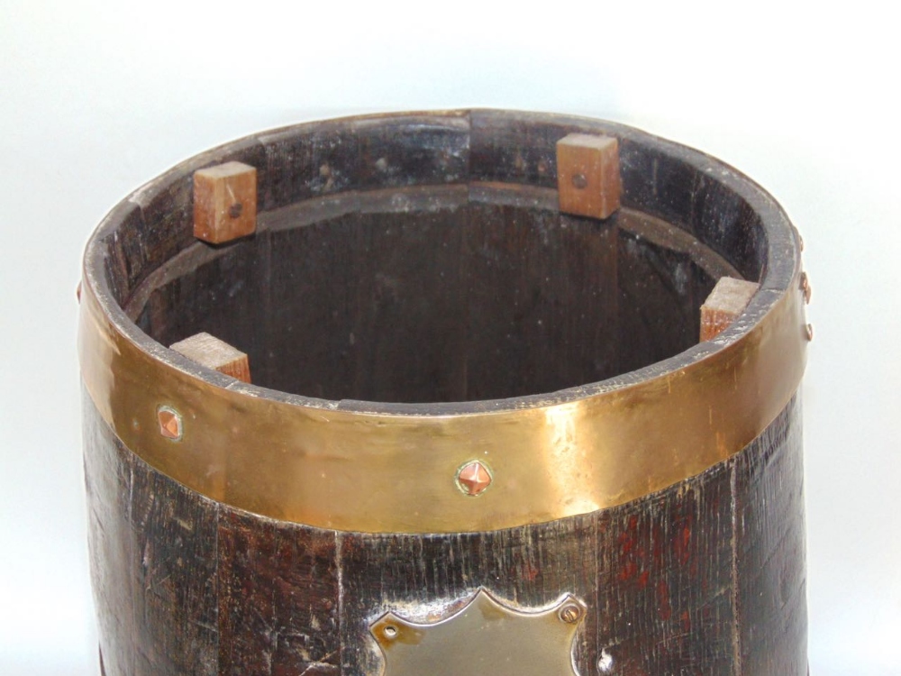 Oak and brass bound lidded barrel, with un-engraved white metal crest and copper rivets, 40cm high - Image 2 of 2