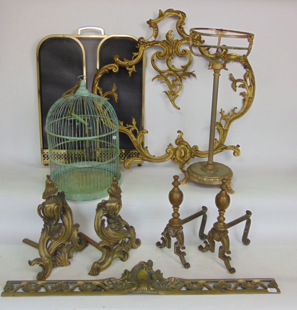 A mixed metalware lot to include an antique cast ormolu pair of chenets with centre piece, pair of