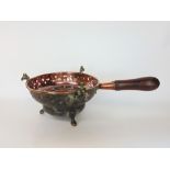 Three 19th century and earlier braziers, mainly in copper with turned wood handles