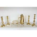 A mixed collection of brass ware to include a pair of baluster brass candlesticks, two further brass