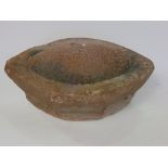 Antique stone mortar of oval form