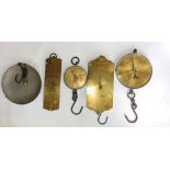 Four sets of polished brass Salter trade spring balanced scales with iron fittings