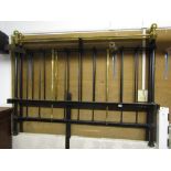A good quality Victorian style brass and iron double bedstead with vertical rails and polished brass