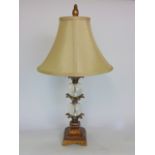 Good quality scrambled wood glass and cast metal table lamp in the form of a palm upon a stepped