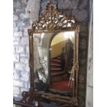 A good quality Georgian style wall mirror of rectangular form, the gilt moulded frame with