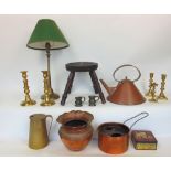 A box containing a collection of antique copper ware together with a further carved four legged