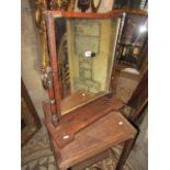 A 19th century mahogany toilet mirror with turned columns and shaped platform base, a pair of oak