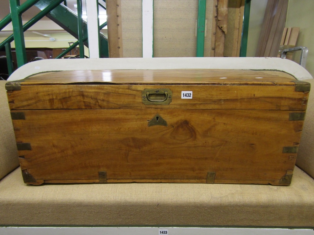 A 19th century camphor wood travelling box with flush fitting brass banded borders