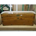 A 19th century camphor wood travelling box with flush fitting brass banded borders