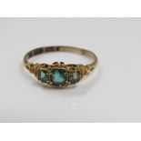 A Victorian three stone green garnet ring in 15ct gold, size R, 1.5g