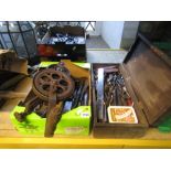 A vintage cast iron hand operated bench grinder with sharpening stone together with a quantity of