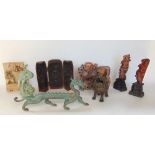 A collection of interesting oriental wares to include a cast bronze figure of a Dog of Fo, patinated