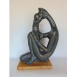 An Abstract plaster sculptural study of mother and child upon a wooden plinth base, 56cm high