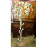 A contemporary painted metal standard lamp, the stem in the form of entwined fruiting vine with