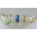 A collection of nine various glass light shades