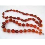 Two agate bead necklaces both with silver clasps, one interspersed with cultured pearls