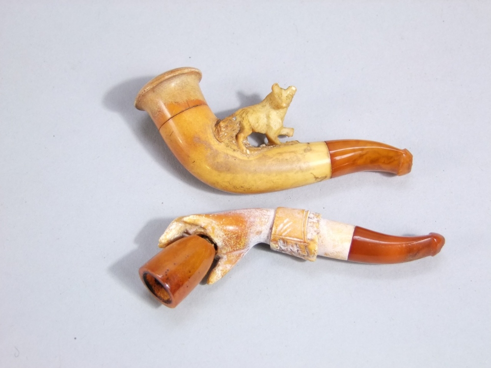 Two 19th century Meerschaum cheroot holders, both cased, a hand clasping a beaker and a startled - Image 2 of 3