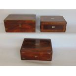 Three 19th century wooden boxes to include a rosewood and brass bound writing slope, a further