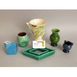 Three boxes containing a selection of miscellaneous items to include glazed pottery wares, various
