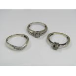 Three diamond set rings comprising two in 9ct white gold and the third in unmarked white metal, 5.5g