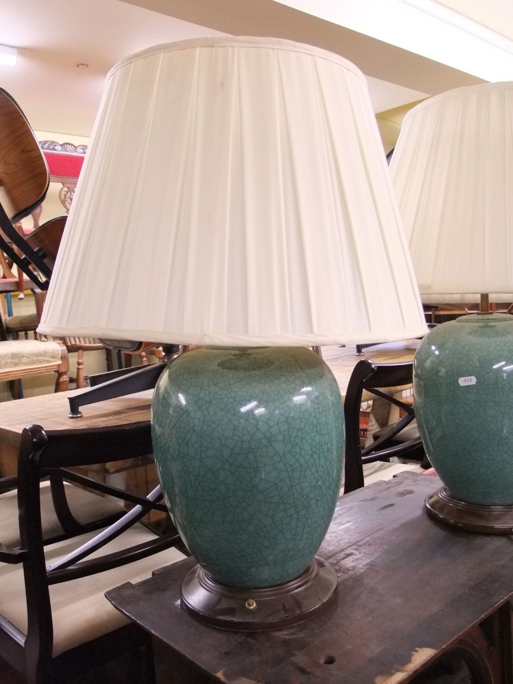 A pair of Chinese style celadon glazed oviform vases presented as table lamps, raised on turned - Image 2 of 3