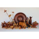 A collection of various treen items to include novelty carved Rhino, toadstools, woodworking tools