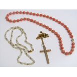 A 9ct necklace with cross pendant together with three further necklaces, each with 9ct clasp,