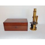 Good quality mahogany cased students microscope by Nachet of Paris