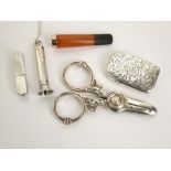 A mixed bijouterie and smoking lot to include a silver vesta case, a silver cigar piercer, engine
