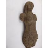 A hardwood figure head with carved detail including acanthus carving, 60cm long