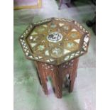 An eastern sewing/work box of octagonal form with hinged lid and decorative mother of pearl