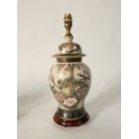 A Rochamp Kutani table lamp of ovoid form with painted and gilded bird and flowering tree detail,